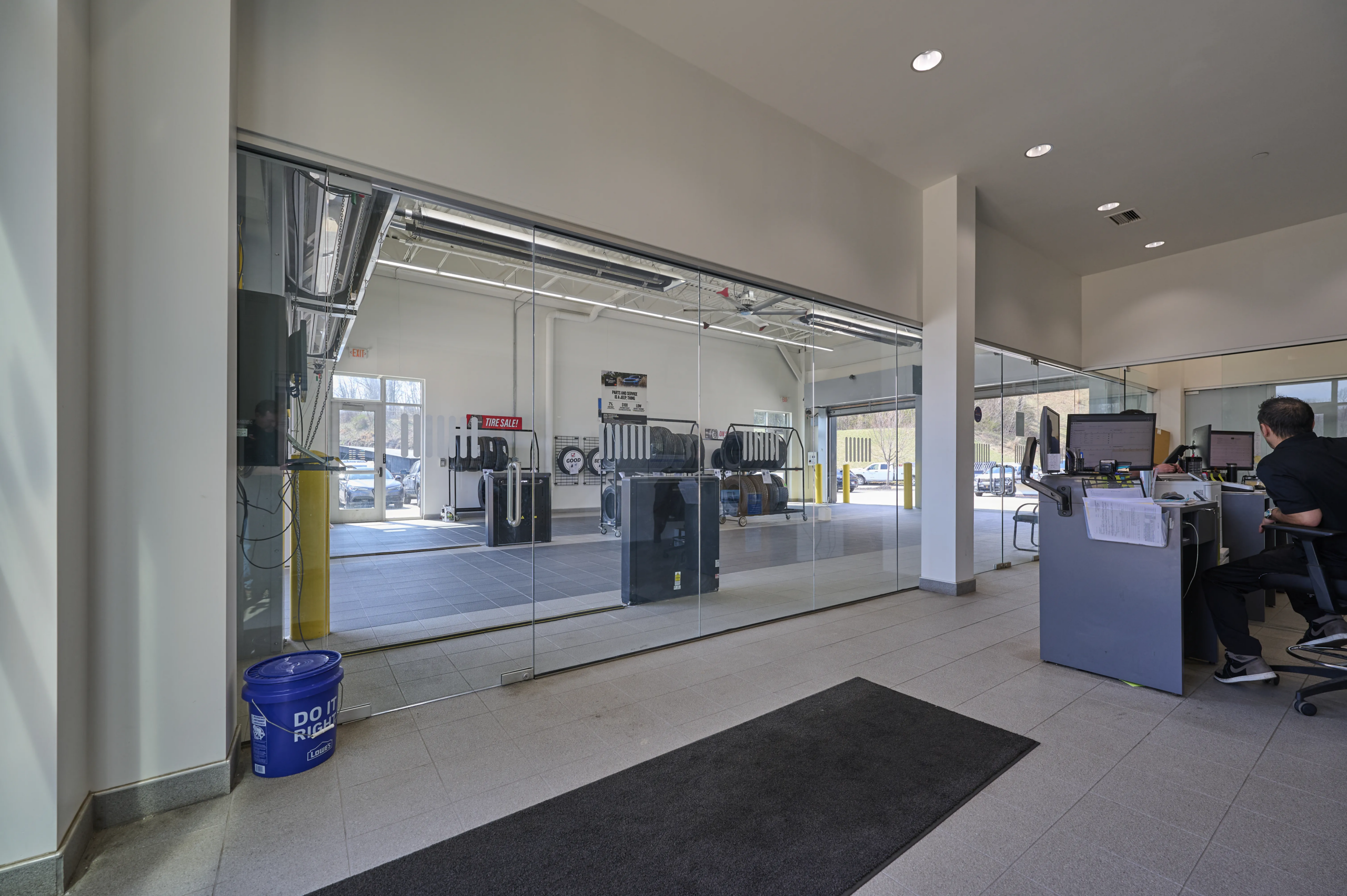 Service area showcasing mixed materials and lofted ceilings
